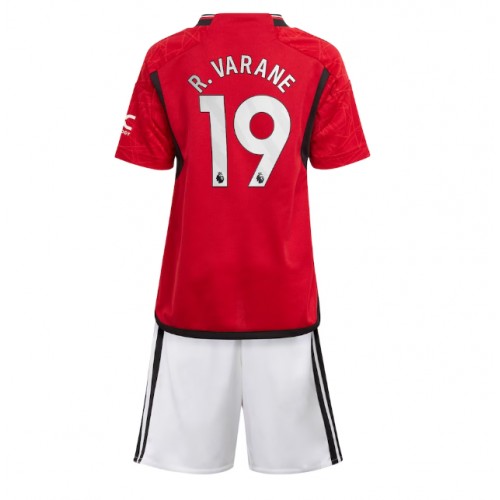 Otroški Nogometni dresi Manchester United Raphael Varane #19 Domači 2023-24 Kratek Rokav (+ Kratke hlače)